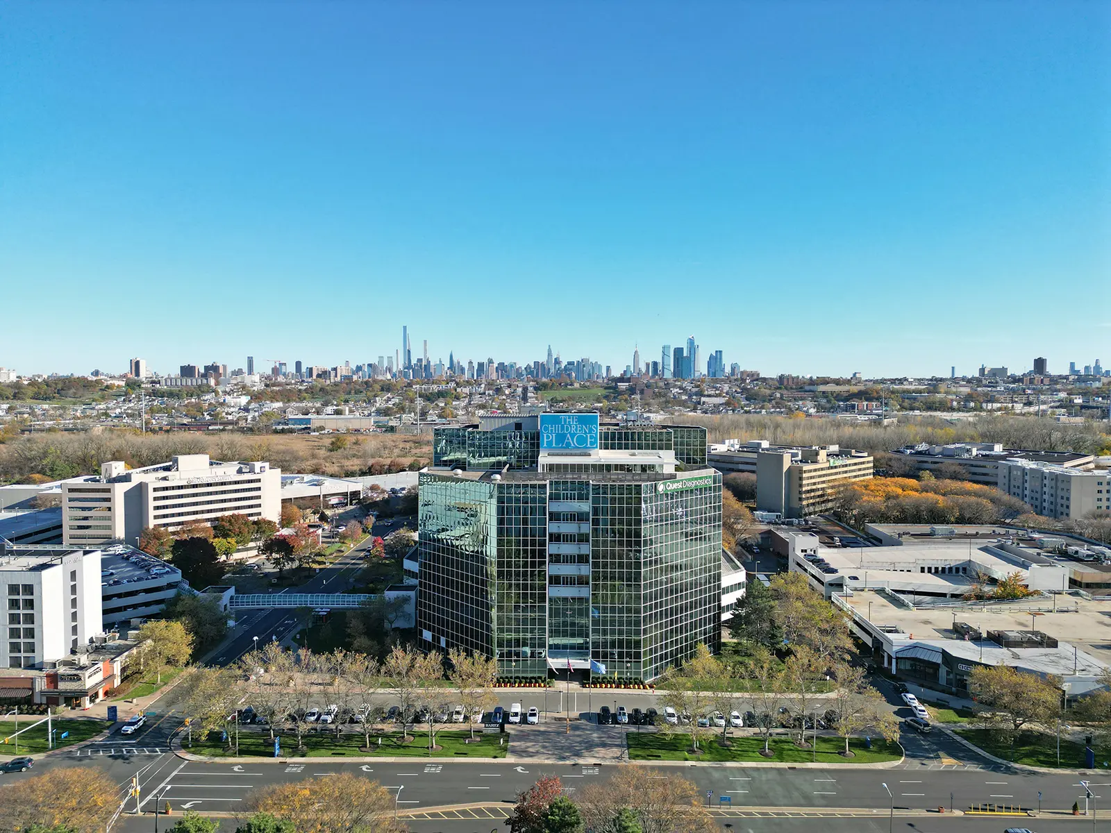 An office tower in the Signature Acquisitions portfolio with the Manhattan skyline behind it